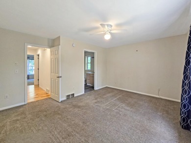 This low-maintenance 3-bedroom, 2-bath home features a bright on Michaywe Pines Course in Michigan - for sale on GolfHomes.com, golf home, golf lot