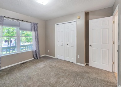 This low-maintenance 3-bedroom, 2-bath home features a bright on Michaywe Pines Course in Michigan - for sale on GolfHomes.com, golf home, golf lot