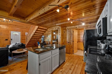 Welcome to Grin and Bear It. This amazing three bedroom, two and on Bent Creek Golf Course in Tennessee - for sale on GolfHomes.com, golf home, golf lot