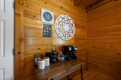 Welcome to Grin and Bear It. This amazing three bedroom, two and on Bent Creek Golf Course in Tennessee - for sale on GolfHomes.com, golf home, golf lot