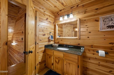 Welcome to Grin and Bear It. This amazing three bedroom, two and on Bent Creek Golf Course in Tennessee - for sale on GolfHomes.com, golf home, golf lot