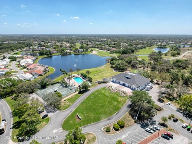 Move in ready, Golf Course in a Gated Community, Modern home on Glen Lakes Country Club in Florida - for sale on GolfHomes.com, golf home, golf lot