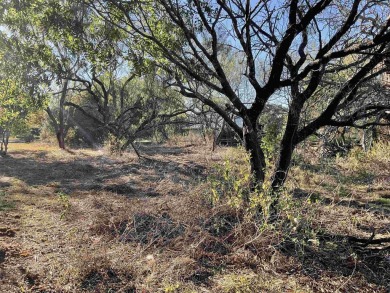 This property is conveniently located in the main amenity area on Slick Rock Golf Course - Horseshoe Bay in Texas - for sale on GolfHomes.com, golf home, golf lot