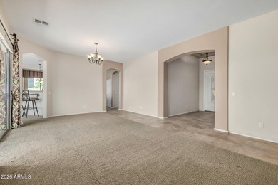 Set on a huge, nearly 12,000-square-foot lot backing to pristine on Estrella Mountain Ranch Golf Course in Arizona - for sale on GolfHomes.com, golf home, golf lot