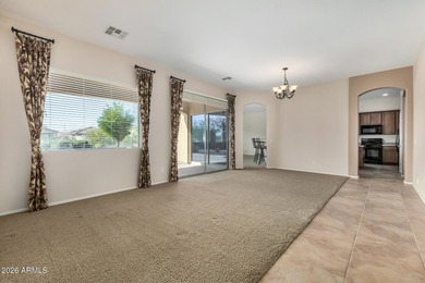 Set on a huge, nearly 12,000-square-foot lot backing to pristine on Estrella Mountain Ranch Golf Course in Arizona - for sale on GolfHomes.com, golf home, golf lot