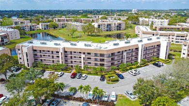 Welcome to this beautifully fully renovated 2nd-floor unit on Sunrise Lakes Phase IV Golf Course in Florida - for sale on GolfHomes.com, golf home, golf lot