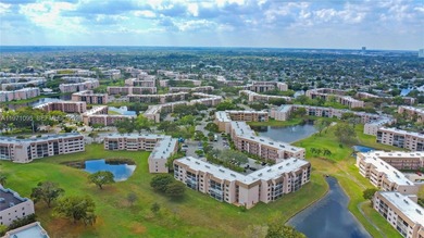 Welcome to this beautifully fully renovated 2nd-floor unit on Sunrise Lakes Phase IV Golf Course in Florida - for sale on GolfHomes.com, golf home, golf lot