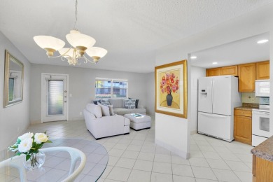 1st floor condo nestled in the vibrant 55+ community of Kings on Kings Point Golf -Flanders Way in Florida - for sale on GolfHomes.com, golf home, golf lot