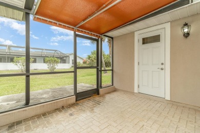 Located in a military country club, this expanded Austin model on Indian River Colony Club in Florida - for sale on GolfHomes.com, golf home, golf lot