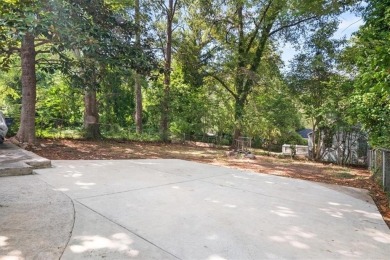 Come home to a quiet, adorable cottage that's been updated with on John A. White Golf Course in Georgia - for sale on GolfHomes.com, golf home, golf lot