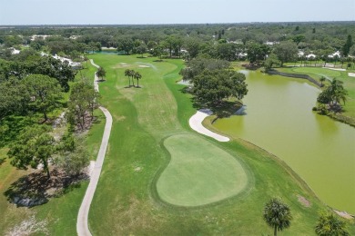 Under contract-accepting backup offers. Welcome home to this on Plantation Golf and Country Club in Florida - for sale on GolfHomes.com, golf home, golf lot