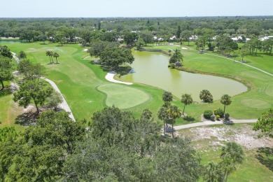 Under contract-accepting backup offers. Welcome home to this on Plantation Golf and Country Club in Florida - for sale on GolfHomes.com, golf home, golf lot