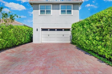 One or more photo(s) has been virtually staged. Tucked within on Eagle Creek Golf Club in Florida - for sale on GolfHomes.com, golf home, golf lot