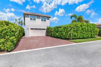 One or more photo(s) has been virtually staged. Tucked within on Eagle Creek Golf Club in Florida - for sale on GolfHomes.com, golf home, golf lot