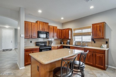 Welcome to this beautifully maintained Ryland home in Golf on Estrella Mountain Ranch Golf Course in Arizona - for sale on GolfHomes.com, golf home, golf lot