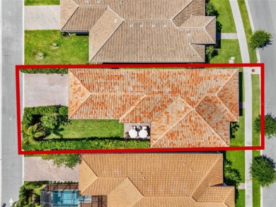 One or more photo(s) has been virtually staged. Tucked within on Eagle Creek Golf Club in Florida - for sale on GolfHomes.com, golf home, golf lot
