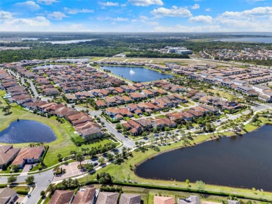 One or more photo(s) has been virtually staged. Tucked within on Eagle Creek Golf Club in Florida - for sale on GolfHomes.com, golf home, golf lot