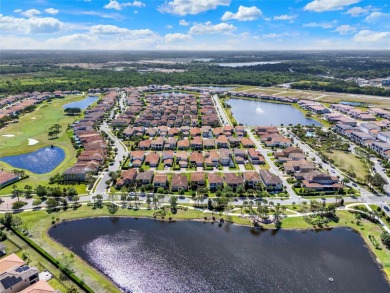 One or more photo(s) has been virtually staged. Tucked within on Eagle Creek Golf Club in Florida - for sale on GolfHomes.com, golf home, golf lot
