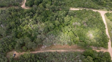 Nice lot in Tahitian Village ready for your personal touch on Pine Forest Golf Club in Texas - for sale on GolfHomes.com, golf home, golf lot
