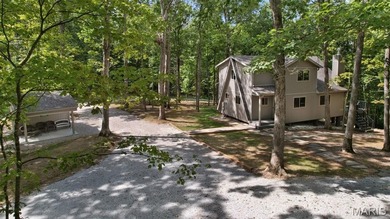 Completed in March 2025, this nearly brand-new chalet features on Innsbrook Resort Golf Course in Missouri - for sale on GolfHomes.com, golf home, golf lot