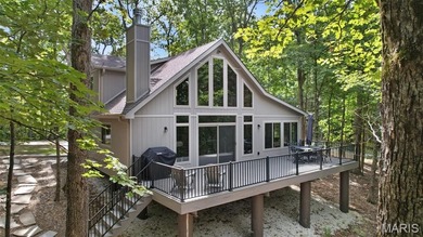 Completed in March 2025, this nearly brand-new chalet features on Innsbrook Resort Golf Course in Missouri - for sale on GolfHomes.com, golf home, golf lot