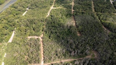 Nice lot in Tahitian Village ready for your personal touch on Pine Forest Golf Club in Texas - for sale on GolfHomes.com, golf home, golf lot