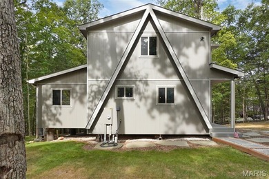 Completed in March 2025, this nearly brand-new chalet features on Innsbrook Resort Golf Course in Missouri - for sale on GolfHomes.com, golf home, golf lot