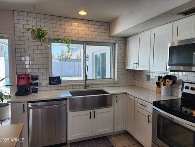 TAKE A LOOK!!! 4 bedroom/2 bath home with 2,000 sq ft living on Dobson Ranch Municipal Golf Course in Arizona - for sale on GolfHomes.com, golf home, golf lot