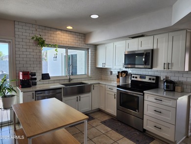 TAKE A LOOK!!! 4 bedroom/2 bath home with 2,000 sq ft living on Dobson Ranch Municipal Golf Course in Arizona - for sale on GolfHomes.com, golf home, golf lot