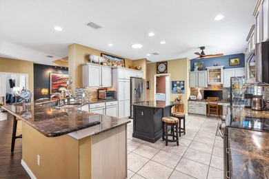 Welcome to this Immaculate Upgraded DESIGNER BRIDGEPORT MODEL on Pennbrooke Fairways in Florida - for sale on GolfHomes.com, golf home, golf lot