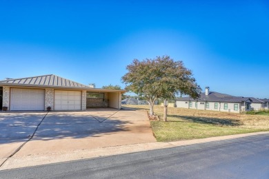 Welcome to this charming single-level townhome at Escape West in on Apple Rock Golf Course - Horseshoe Bay in Texas - for sale on GolfHomes.com, golf home, golf lot