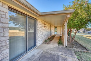 Welcome to this charming single-level townhome at Escape West in on Apple Rock Golf Course - Horseshoe Bay in Texas - for sale on GolfHomes.com, golf home, golf lot