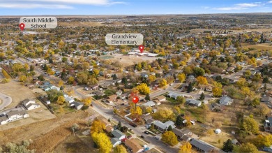 Welcome to this charming four-bedroom, two-bath home in on YMCA Golf Course in South Dakota - for sale on GolfHomes.com, golf home, golf lot