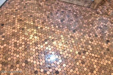 PROPERTY IS UNDER CONTRACT AND ACCEPTING BACK-UP OFFERS ONLY on Lake Naomi Timber Trails Golf Club in Pennsylvania - for sale on GolfHomes.com, golf home, golf lot