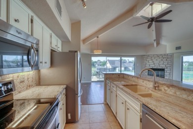 Welcome to this charming single-level townhome at Escape West in on Apple Rock Golf Course - Horseshoe Bay in Texas - for sale on GolfHomes.com, golf home, golf lot