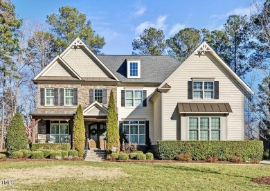 Welcome to your Dream Home perfectly tucked away behind the 8th on Hasentree Club in North Carolina - for sale on GolfHomes.com, golf home, golf lot