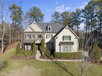 Welcome to your Dream Home perfectly tucked away behind the 8th on Hasentree Club in North Carolina - for sale on GolfHomes.com, golf home, golf lot