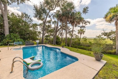 Welcome to 126 Riverwalk Drive, a beautiful residence where on Oak Grove Island Golf and Country Club in Georgia - for sale on GolfHomes.com, golf home, golf lot