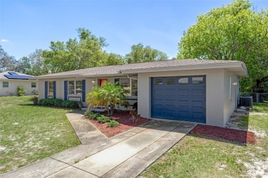 Under contract-accepting backup offers. Welcome to your dream on Oak Hills Country Club in Florida - for sale on GolfHomes.com, golf home, golf lot