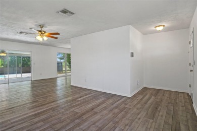 Under contract-accepting backup offers. Welcome to your dream on Oak Hills Country Club in Florida - for sale on GolfHomes.com, golf home, golf lot