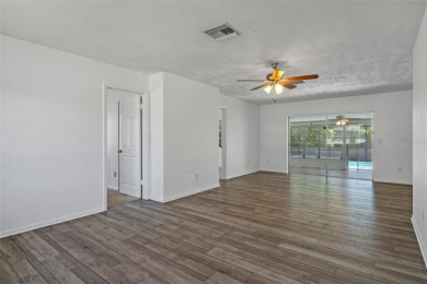 Under contract-accepting backup offers. Welcome to your dream on Oak Hills Country Club in Florida - for sale on GolfHomes.com, golf home, golf lot
