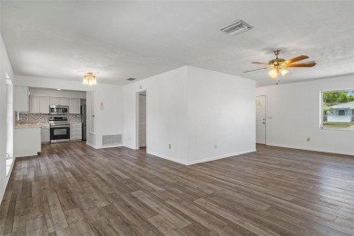 Under contract-accepting backup offers. Welcome to your dream on Oak Hills Country Club in Florida - for sale on GolfHomes.com, golf home, golf lot
