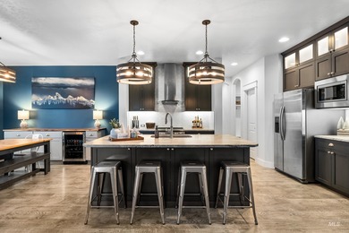 Welcome to this beautifully appointed home offering 5 bedrooms on SpurWing Country Club in Idaho - for sale on GolfHomes.com, golf home, golf lot