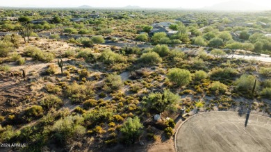 Nestled within the exclusive, member-owned Desert Mountain Club on Desert Mountain - Outlaw Golf Course in Arizona - for sale on GolfHomes.com, golf home, golf lot