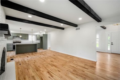 Looking for a better-than-brand-new home? This fully remodeled on National Golf Club of Kansas City in Missouri - for sale on GolfHomes.com, golf home, golf lot