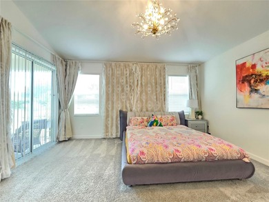 Built in 2024, this 4 bedroom / 3 bathroom Newcastle model on The Oasis Club at Champions Gate in Florida - for sale on GolfHomes.com, golf home, golf lot