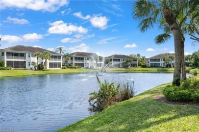 Nicely appointed first floor coach home located directly across on Windstar on Naples Bay in Florida - for sale on GolfHomes.com, golf home, golf lot