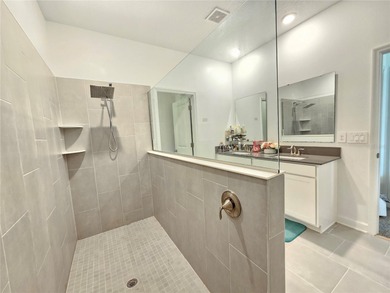 Built in 2024, this 4 bedroom / 3 bathroom Newcastle model on The Oasis Club at Champions Gate in Florida - for sale on GolfHomes.com, golf home, golf lot