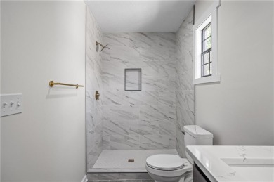 Looking for a better-than-brand-new home? This fully remodeled on National Golf Club of Kansas City in Missouri - for sale on GolfHomes.com, golf home, golf lot
