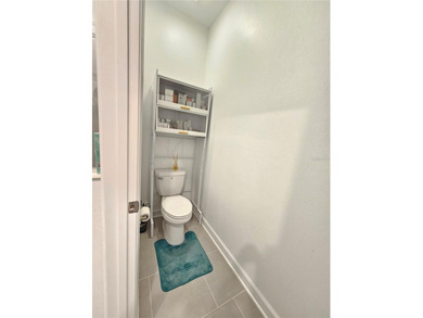 Built in 2024, this 4 bedroom / 3 bathroom Newcastle model on The Oasis Club at Champions Gate in Florida - for sale on GolfHomes.com, golf home, golf lot